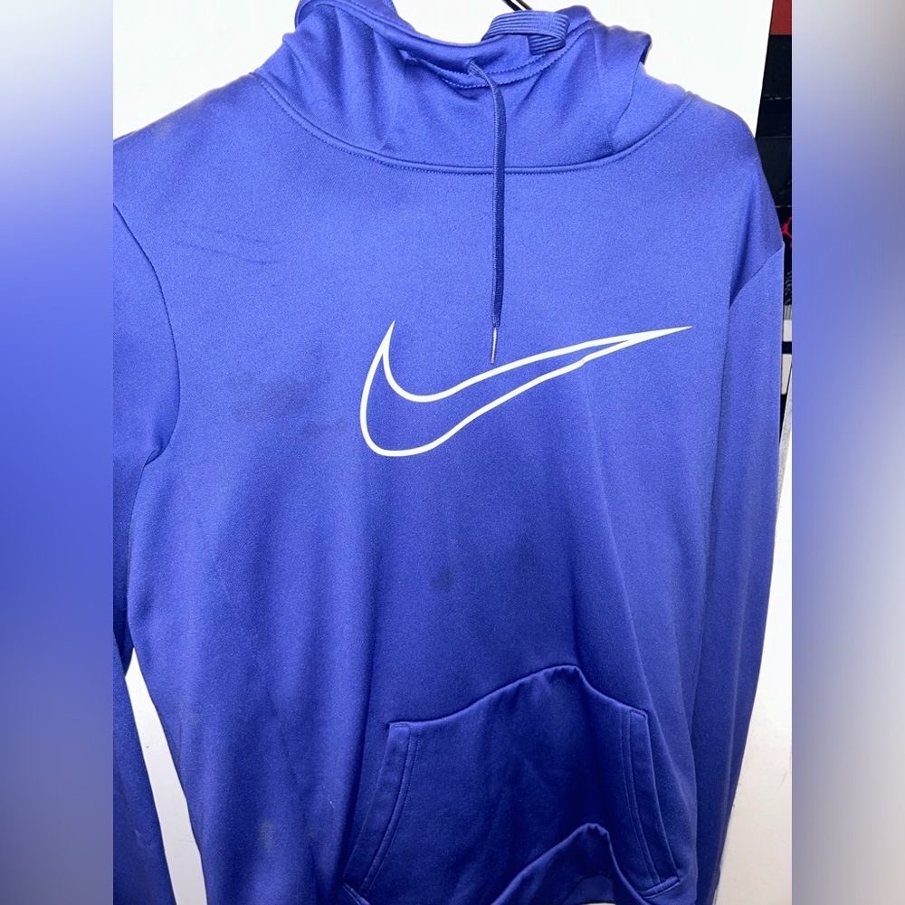 Purple Nike hoodie that covers whole face